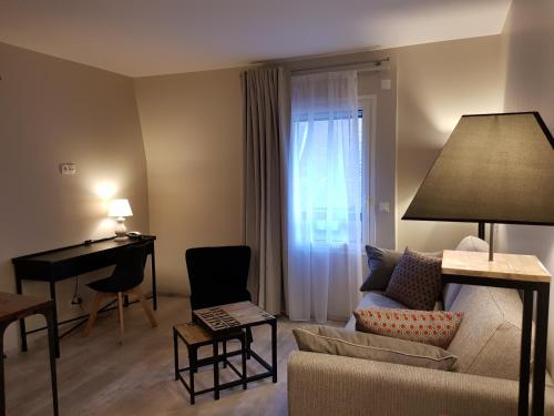 Ruang duduk di La Loggia Appart'Hôtel & Spa