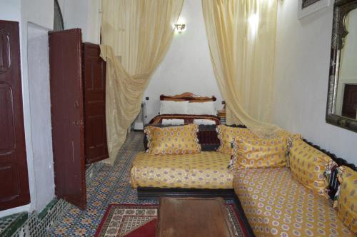 Postel nebo postele na pokoji v ubytování Chez L'habitant Boueden