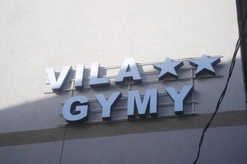 a sign on top of a building with stars on it at Vila Gymy in Constanţa