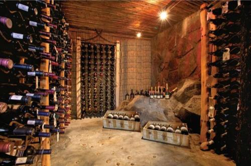 a wine cellar with a bunch of wine bottles at Leopard Hills Private Game Reserve in Sabi Sand Game Reserve