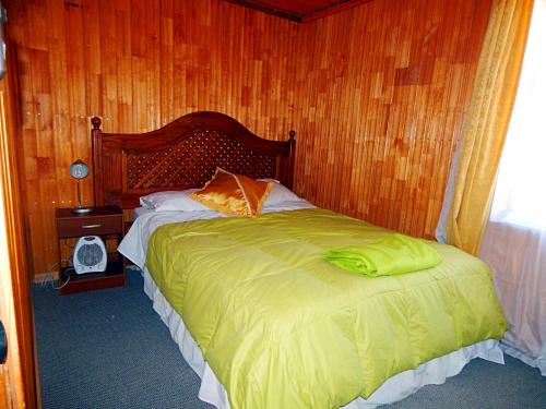 Кровать или кровати в номере Hostal Plaza Maule Express
