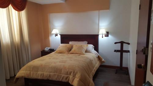 Cama o camas de una habitación en Hotel Hangas Mayo