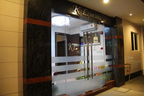 a store front of a korean store with a shoe display at KL Hotel in Labuan