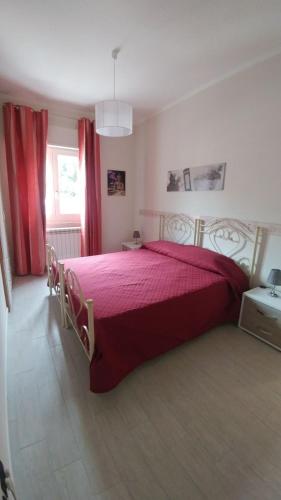Ένα ή περισσότερα κρεβάτια σε δωμάτιο στο B&b I portici