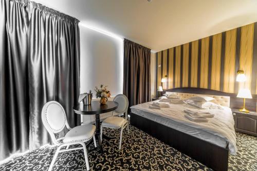 Postel nebo postele na pokoji v ubytování Hotel Complex Havana