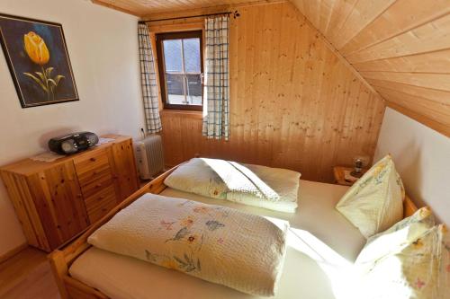 Säng eller sängar i ett rum på Bodnerhof