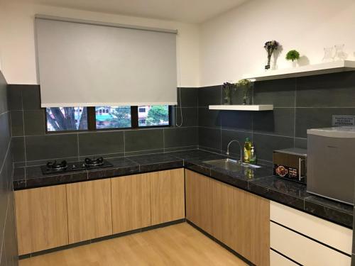 Kuchyň nebo kuchyňský kout v ubytování W boutique 10pax with family karaoke