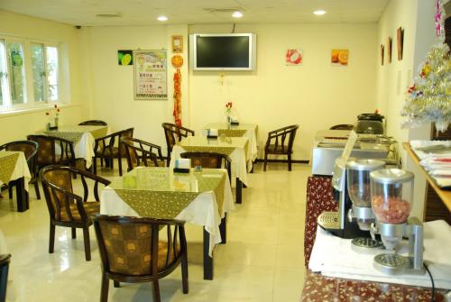 Televisyen dan/atau pusat hiburan di Beckham Motel
