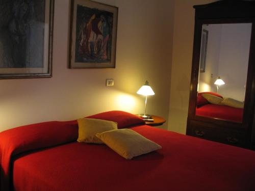 Postel nebo postele na pokoji v ubytování La Rotella Nel Sacco