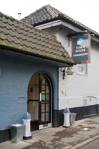 a blue and white building with a sign on it at The Town House by Innkeeper's Collection in Norwich