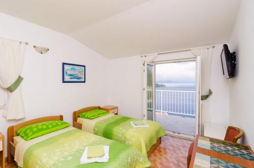 Vuode tai vuoteita majoituspaikassa Adriatic-apartment & seaview pool