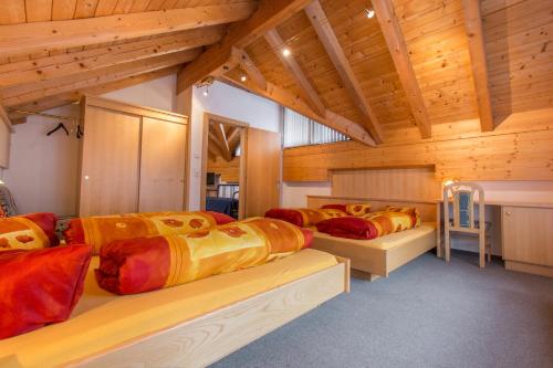 Tempat tidur dalam kamar di Haus Dorfschmied