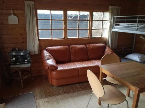 A seating area at Hjemstavnsgårdens Camping & Cottages