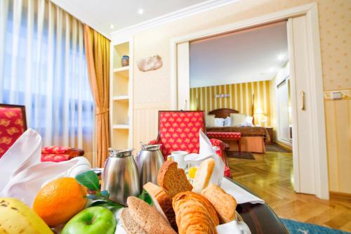 a tray of food on a table in a hotel room at Eurostars Araguaney in Santiago de Compostela