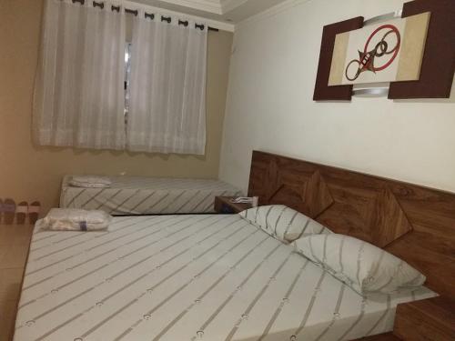 Ένα ή περισσότερα κρεβάτια σε δωμάτιο στο Hotel Flex In