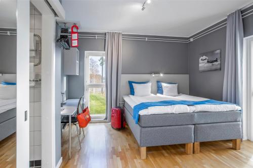 Postel nebo postele na pokoji v ubytování Aiden by Best Western Skavsta Airport