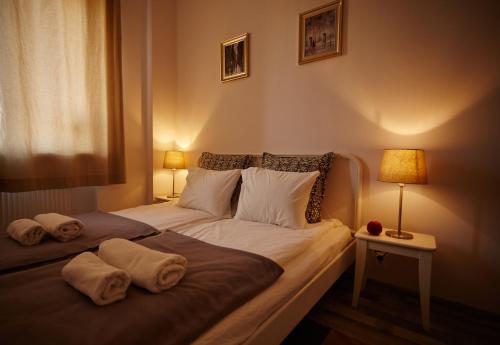 Ένα ή περισσότερα κρεβάτια σε δωμάτιο στο Marszałkowska Apartament