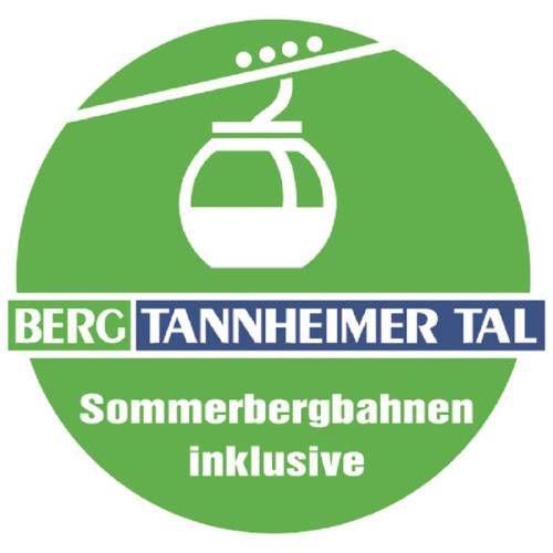 a green sign with a teapot on it at Haus Bilgeri in Nesselwängle