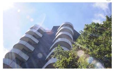 a tall building with balconies on the side of it at Ringhotel Parkhotel Witten in Witten