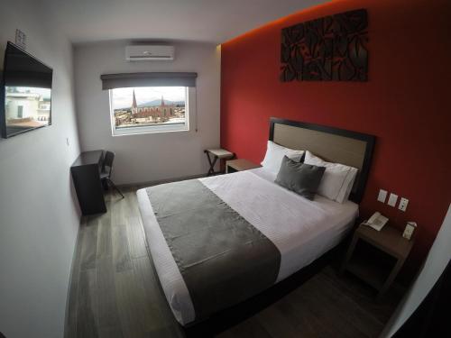 Ένα ή περισσότερα κρεβάτια σε δωμάτιο στο Terrass Hotel Zamora