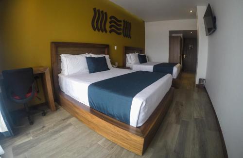 Ένα ή περισσότερα κρεβάτια σε δωμάτιο στο Terrass Hotel Zamora