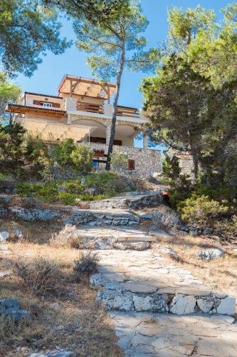 Κήπος έξω από το Pavao Apartments