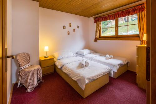 Posteľ alebo postele v izbe v ubytovaní Apartmán Vŕšky Terchová