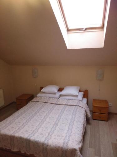 Postel nebo postele na pokoji v ubytování Atlant Hotel