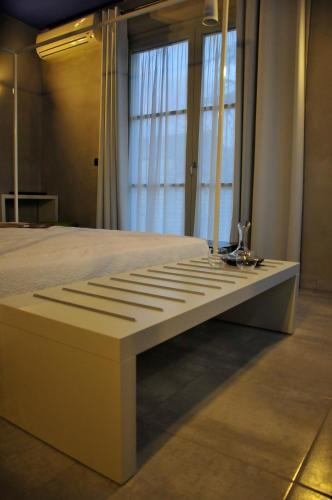 Una cama o camas en una habitación de Ai Lecci in Centro