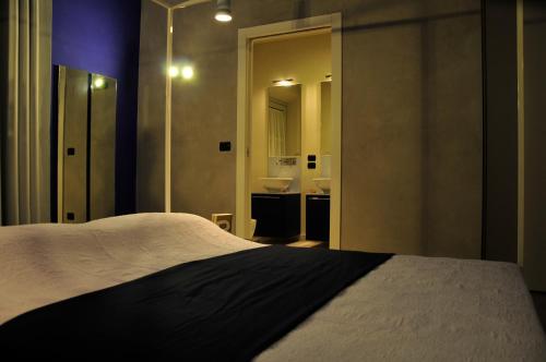 Una cama o camas en una habitación de Ai Lecci in Centro