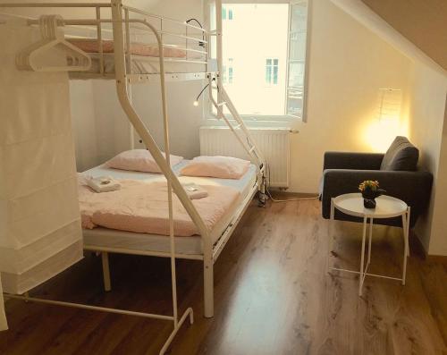 A bed or beds in a room at Sishaus - View at Mozarts