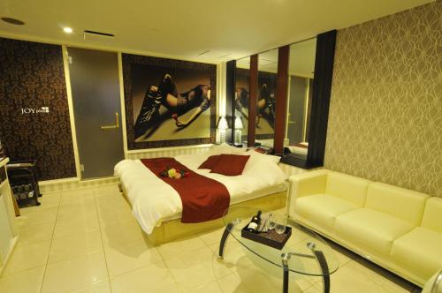 Χώρος καθιστικού στο Hotel Joyplus (Love Hotel)