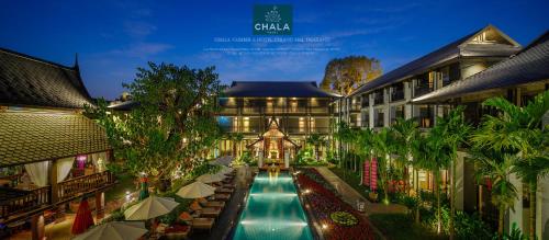 an overhead view of a hotel with a swimming pool at Chala Number6 in Chiang Mai