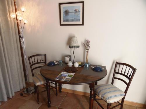 Un lugar para sentarse en Chambres d'hôtes du Parc d'Espagne