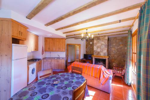 Postel nebo postele na pokoji v ubytování Apartamentos Ribera del Júcar