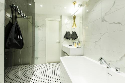 Koupelna v ubytování Quality Hotel Sveitsi
