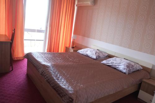 Ένα ή περισσότερα κρεβάτια σε δωμάτιο στο Guest House Grgin Dol
