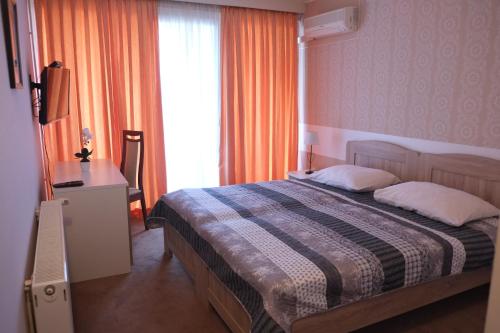 Ένα ή περισσότερα κρεβάτια σε δωμάτιο στο Guest House Grgin Dol