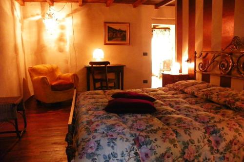 Agriturismo Oro di Berta tesisinde bir odada yatak veya yataklar