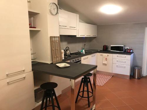 Virtuvė arba virtuvėlė apgyvendinimo įstaigoje La Ghirlanda B&B