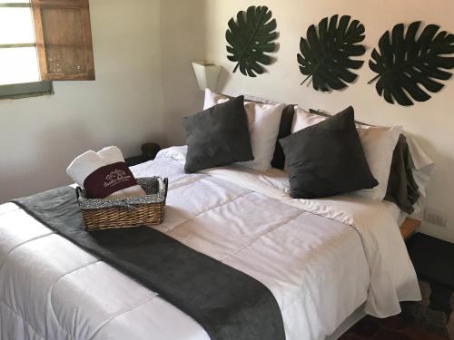 Postel nebo postele na pokoji v ubytování Hotel Casitas Barro Iza Boyaca