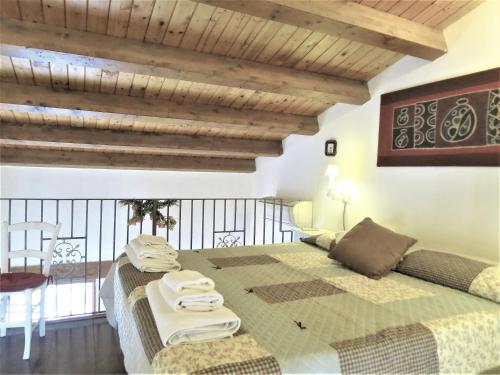 A bed or beds in a room at La Casa Delle Fate