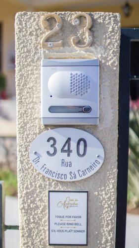 a sign for a spa with a price at Casa das Andorinhas in Ponte de Lima