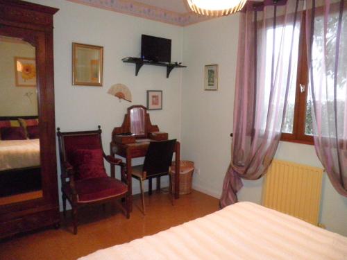 Katil atau katil-katil dalam bilik di Chambres d'hôtes Les Nefliers