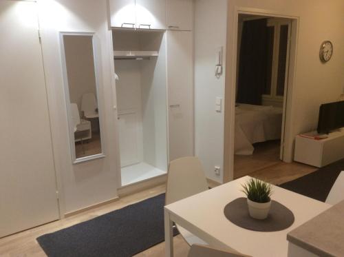 Ett badrum på Kotimaailma Apartments Rovaniemi