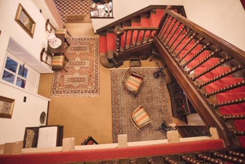 an auditorium with a staircase with ties on the wall at La Crestolina in Ala di Stura