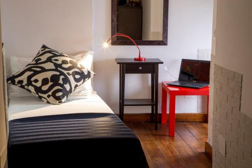 Katil atau katil-katil dalam bilik di Trastevere Apartments