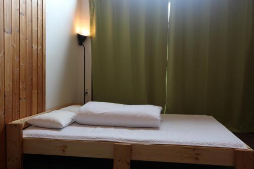 Letto o letti in una camera di Guesthouse Kim's Cabin