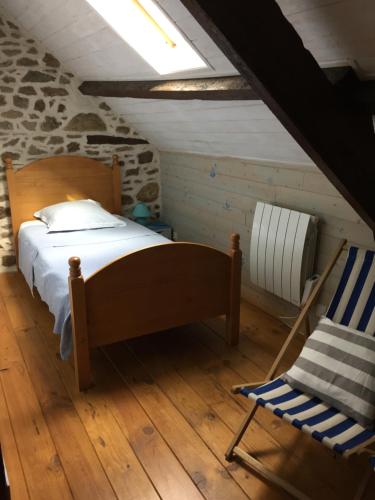מיטה או מיטות בחדר ב-Gîtes au Clos du Lit