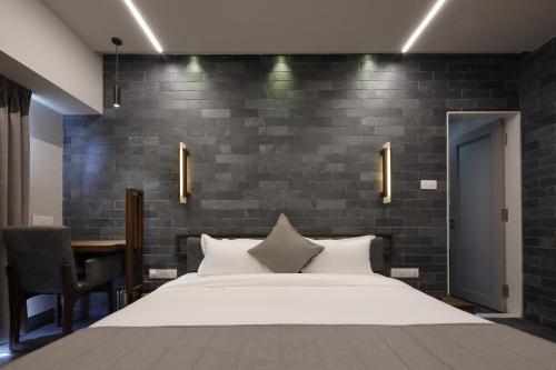 Postel nebo postele na pokoji v ubytování Hotel Carrefour